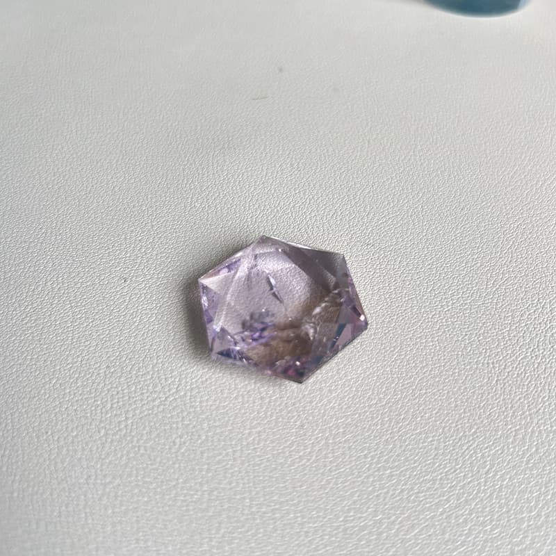 Hexagram Amethyst crystal carving used as meditation and healing tool