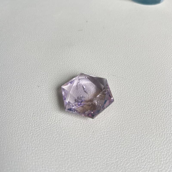 Hexagram Amethyst crystal carving used as meditation and healing tool