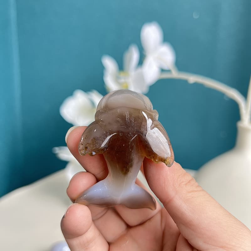 White agate crystal dolphin highlighting natural translucency and healing properties