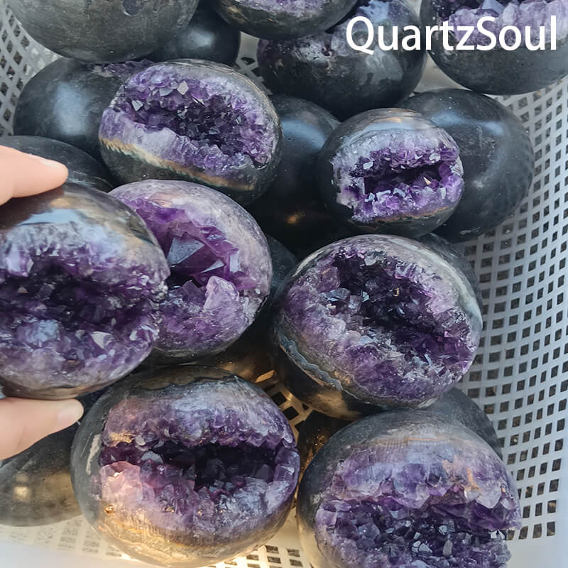 Collection of natural amethyst geode spheres for wholesale crystal suppliers