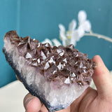 Close-up of amethyst crystal formation showing natural terminations