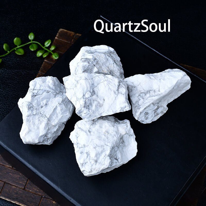 Collection of authentic raw Howlite crystals showcasing natural white color and gray marbled patterns