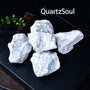 Collection of authentic raw Howlite crystals showcasing natural white color and gray marbled patterns