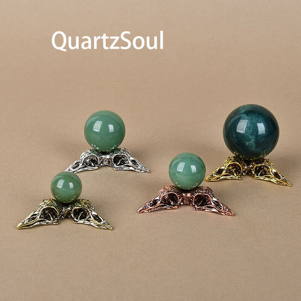 Alloy bird head display stands with jade and bloodstone crystal spheres