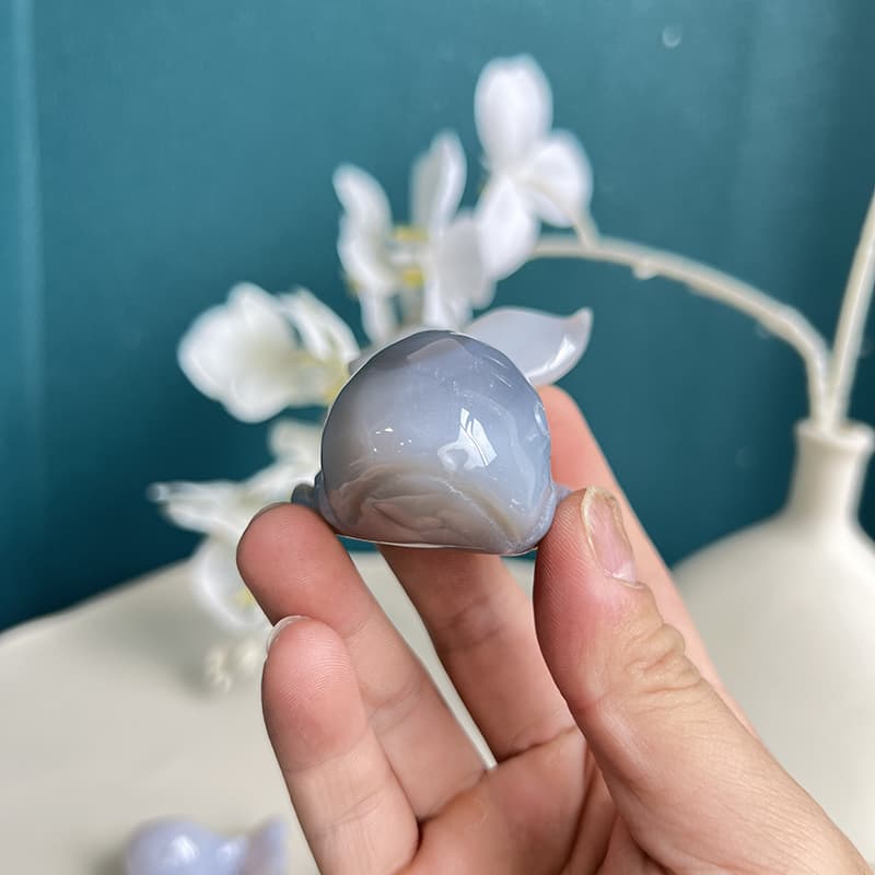 Detailed craftsmanship of blue agate whale crystal carving