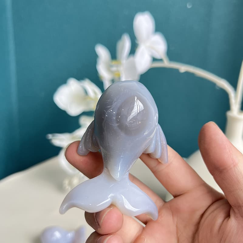 Blue agate whale crystal carving used in meditation practice