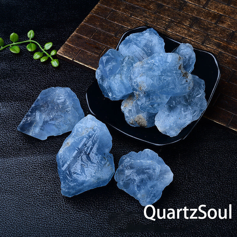 Raw blue Celestine crystal specimens arranged on display tray for collectors