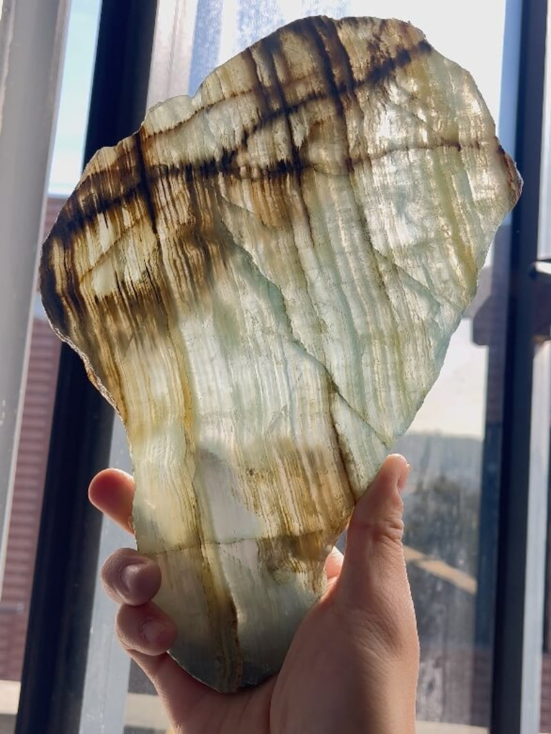 Color variations in natural blue onyx wholesale slabs