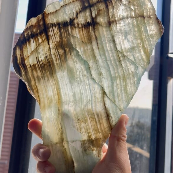 Color variations in natural blue onyx wholesale slabs