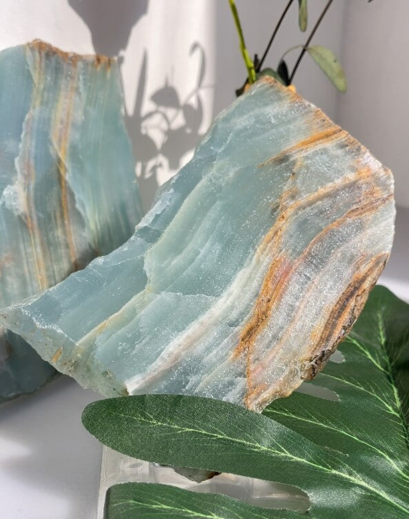 Blue onyx slab used as foundation for crystal grid