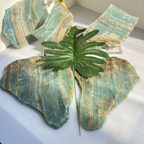 Blue onyx wholesale slab showing natural light reflection