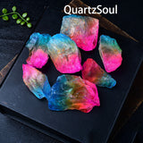 Natural raw crystal quartz with electroplated blue and pink finish on display plate