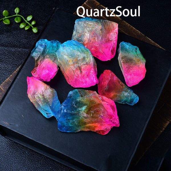 Natural raw crystal quartz with electroplated blue and pink finish on display plate