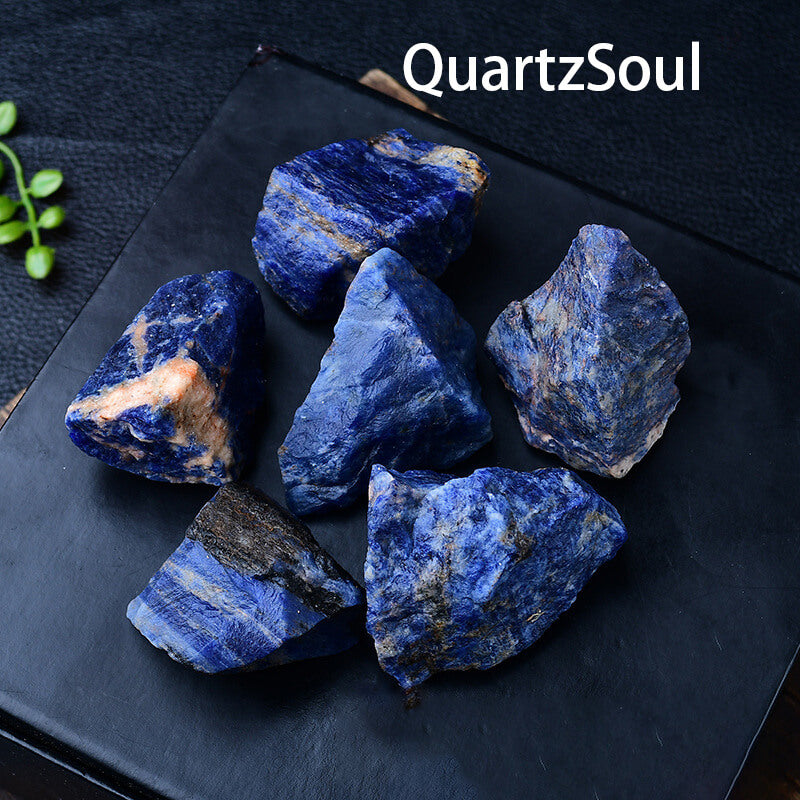Bulk collection of authentic raw Sodalite crystal specimens showing deep blue coloration
