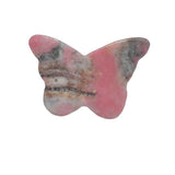 Butterfly shape pink rhodonite carving showing detailed wing textures