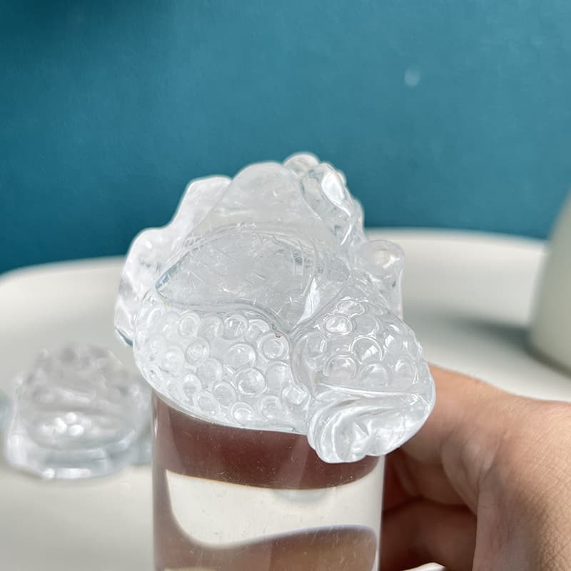 Carved crystal toad collectors item in clear quartz