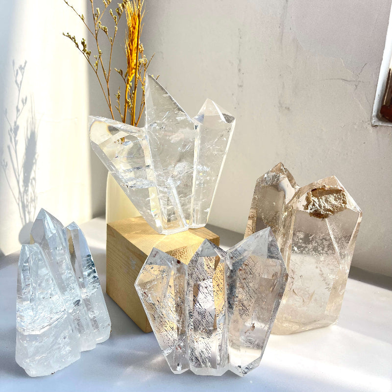 Single premium clear quartz point showing clarity and termination