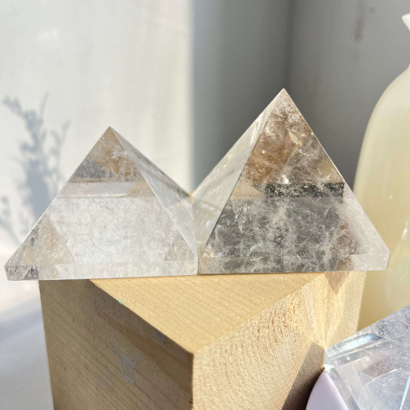 Close up view of a clear quartz pyramid healing crystal