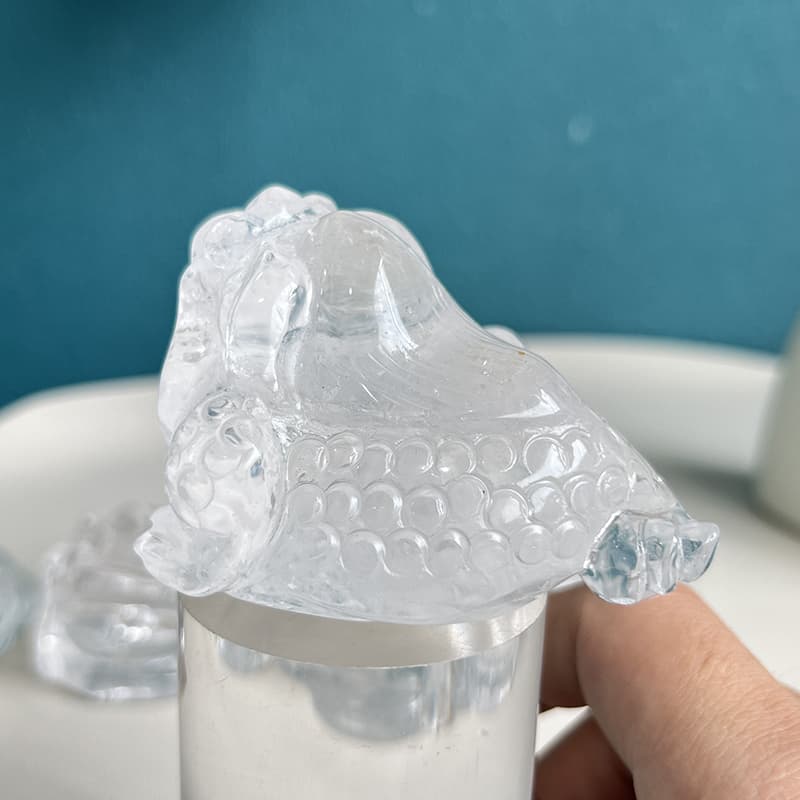 Energy properties visualization of clear quartz golden toad carving
