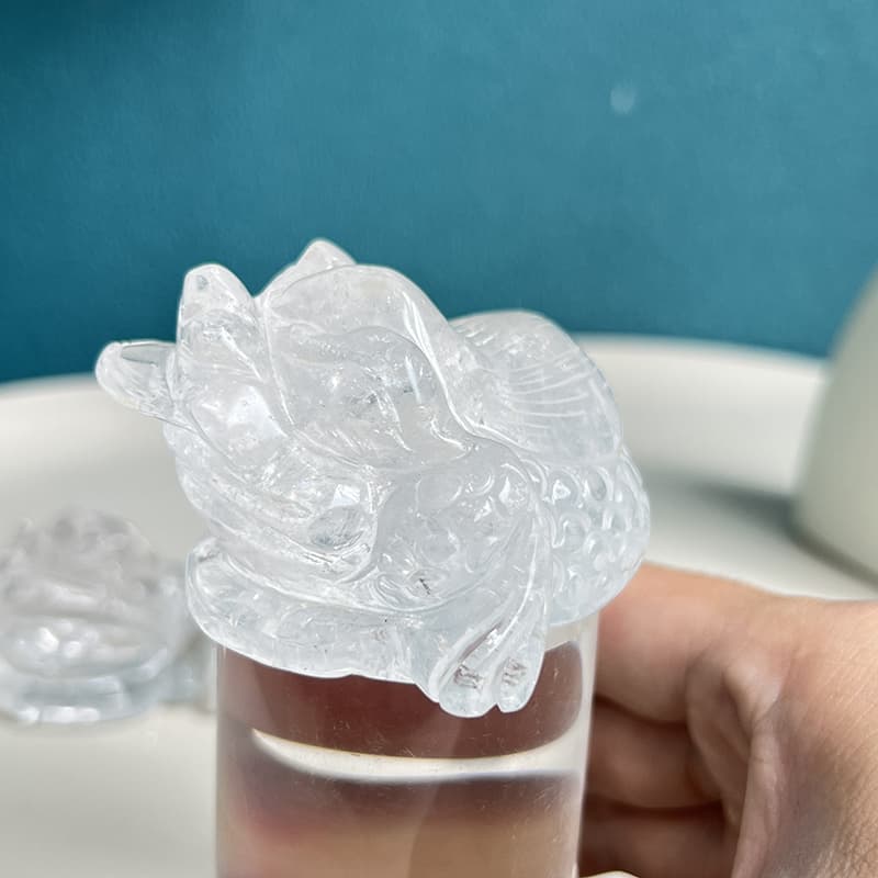 Quality craftsmanship in clear quartz toad crystal carving