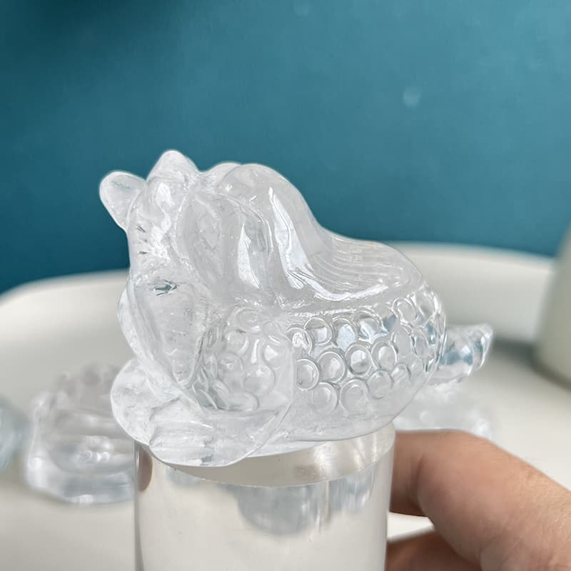 Wealth attraction placement of clear quartz golden toad carving