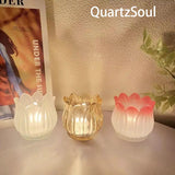 Collection of crystal tulip holders in transparent, amber and gradient pink for home decoration
