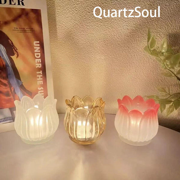 Collection of crystal tulip holders in transparent, amber and gradient pink for home decoration