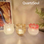 Collection of crystal tulip holders in transparent, amber and gradient pink for home decoration