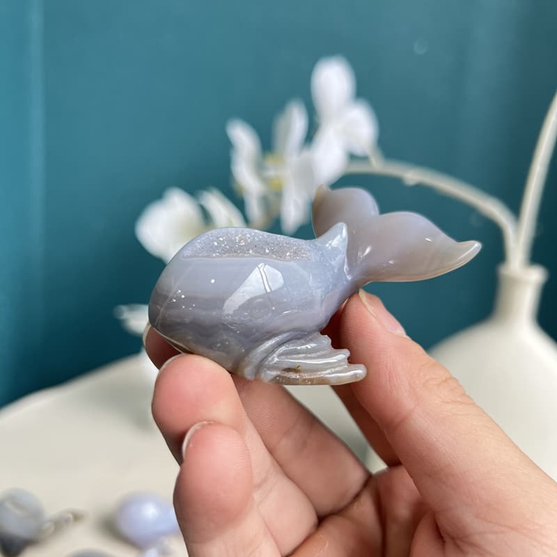 Full body dolphin agate crystal carving displaying exquisite craftsmanship and translucent quality