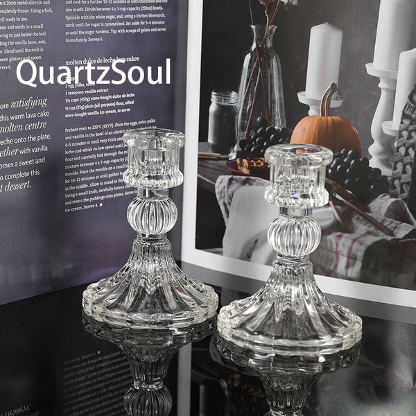 Elegant crystal glass candle holders with ribbed design for displaying candles or crystals
