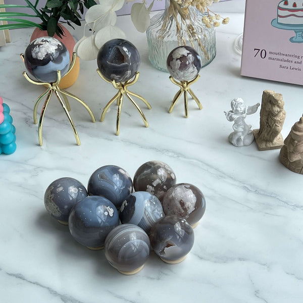 Natural pink and white patterns in premium Flower Agate Sphere