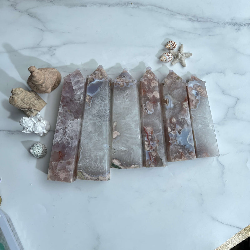 Various sizes of wholesale Flower Agate Towers for crystal suppliers