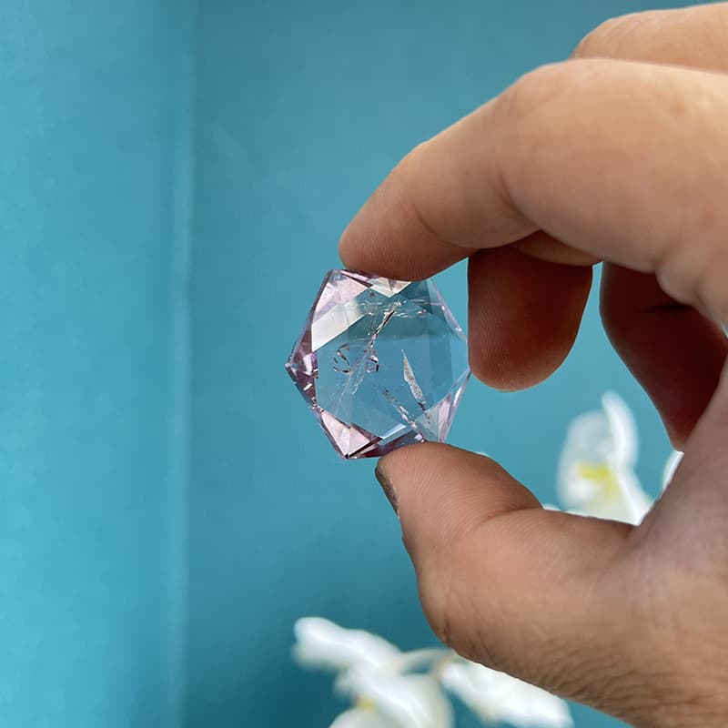 Hexagram fluorite crystal showing beautiful light refraction properties