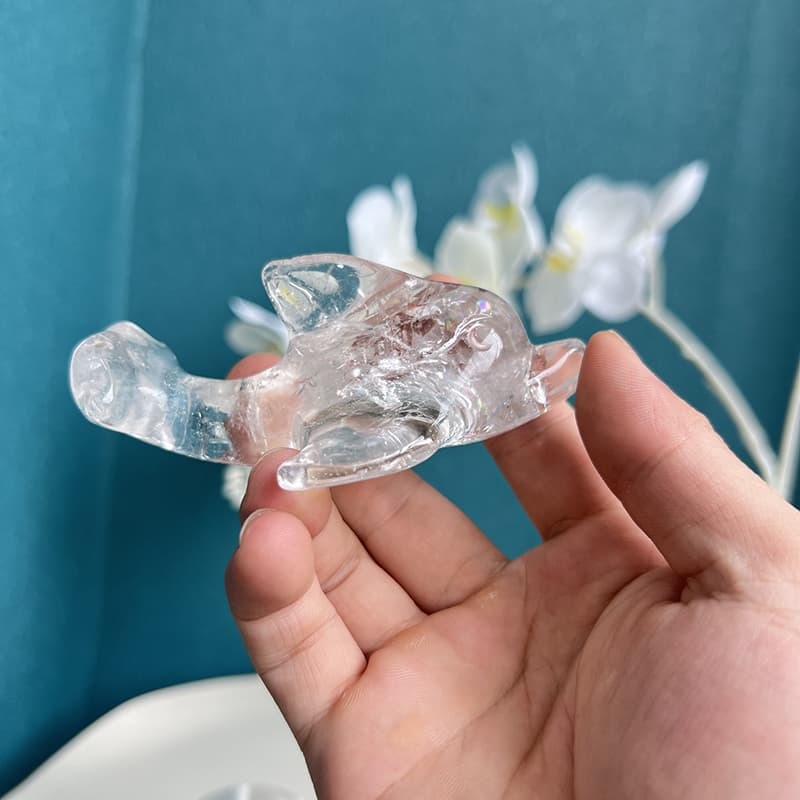Flying fish clear quartz crystal carving with detailed fins and elegant form