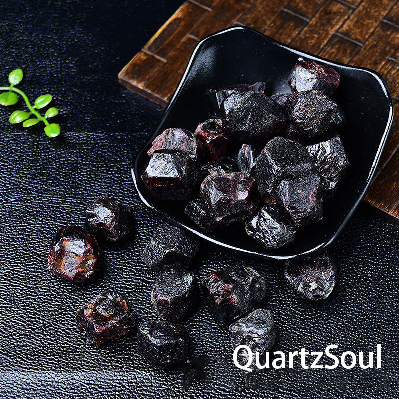 Raw Garnet Crystal Stones Displayed in Black Bowl