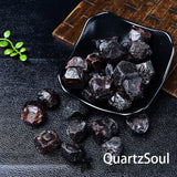Raw Garnet Crystal Stones Displayed in Black Bowl