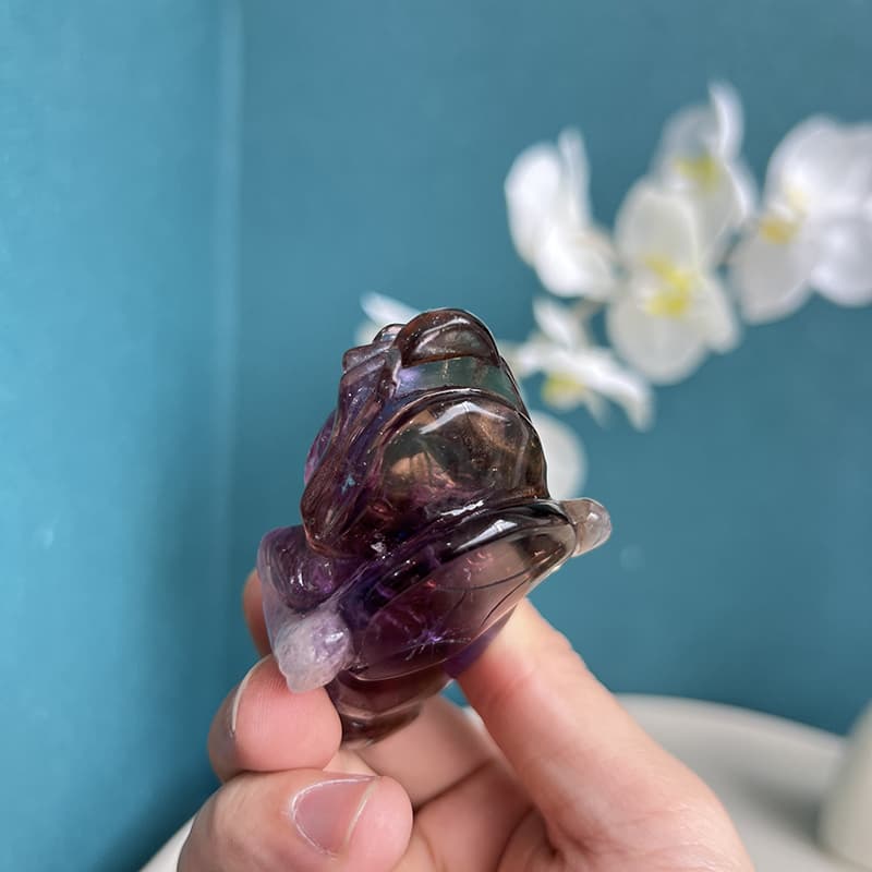 Angled View of Golden Toad Ametrine Crystal Carving