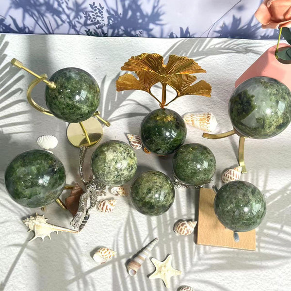 Premium Green Apidote Crystal Sphere with vibrant green color and natural healing properties
