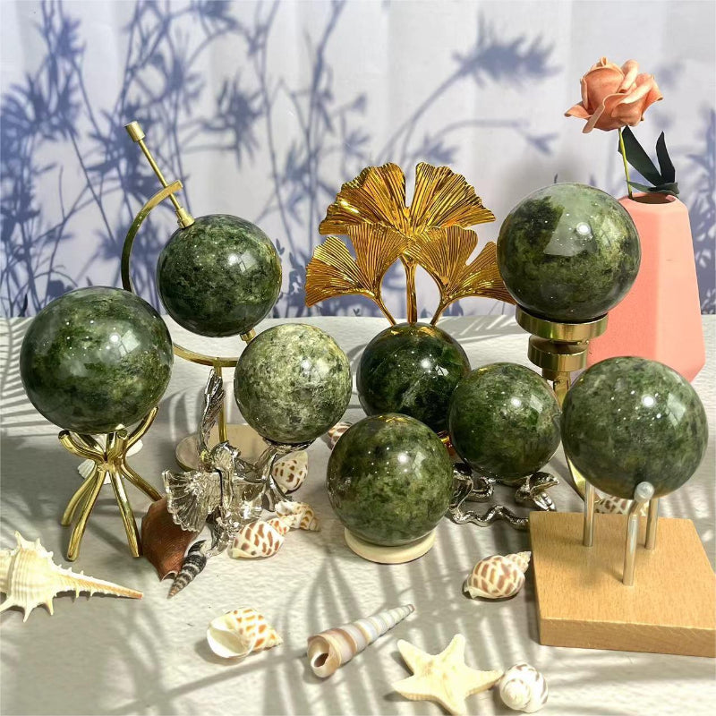 Various sizes of Green Apidote Crystal Spheres for wholesale collection
