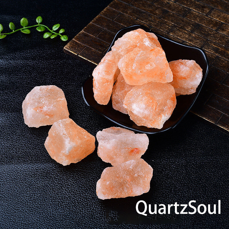 Himalayan salt raw crystals displayed in black decorative dish