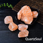 Himalayan salt raw crystals displayed in black decorative dish