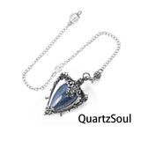 Lapis Lazuli teardrop crystal pendulum with ornate silver setting