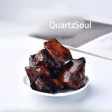 Natural raw Mahogany Obsidian crystal cluster showing deep red and black volcanic patterns