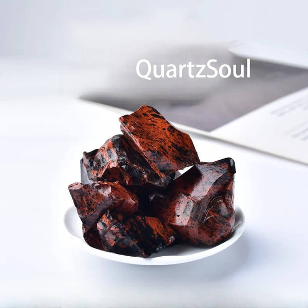 Natural raw Mahogany Obsidian crystal cluster showing deep red and black volcanic patterns
