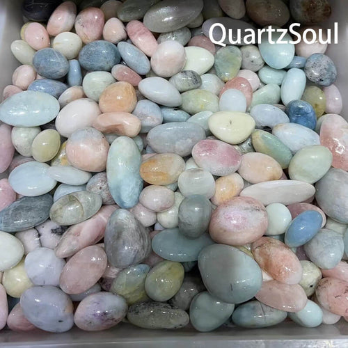 Premium wholesale Morganite tumbled stones in various shades of pink from QuartzSoul
