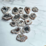 Natural agate slab with polished surface showing colorful mineral bands