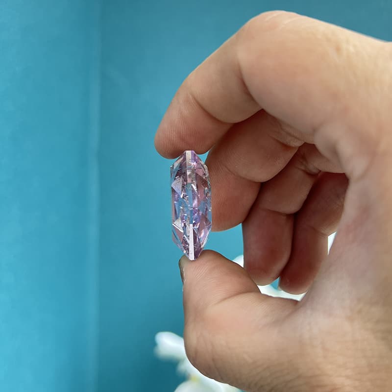 Handcrafted hexagram fluorite crystal carving with unique patterns