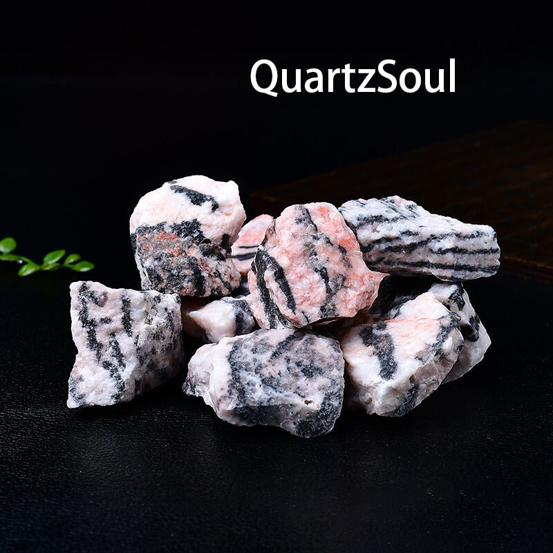 Natural raw Zebra Jasper crystal specimens showing distinctive pink and black striped patterns