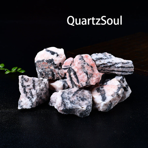 Natural raw Zebra Jasper crystal specimens showing distinctive pink and black striped patterns