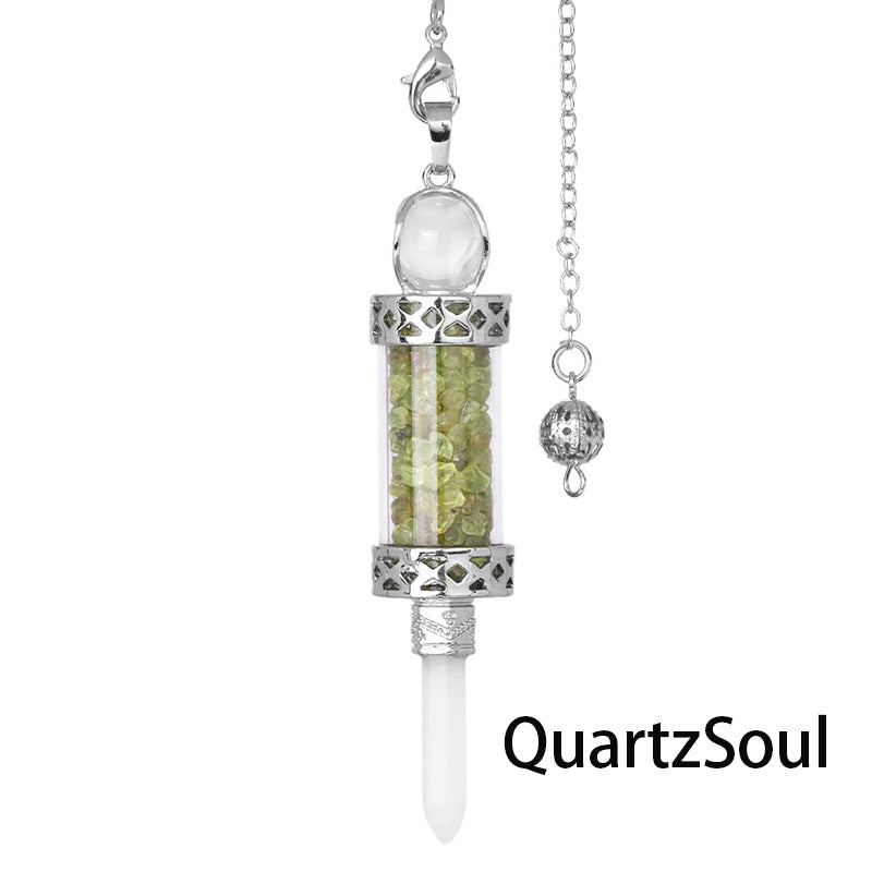 Olivine crystal pendulum with natural stone fragments in transparent chamber